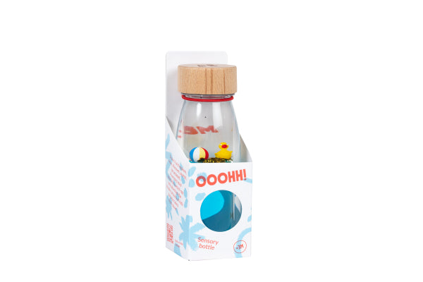 Bouteille sensorielle Canard tenue dans une main
